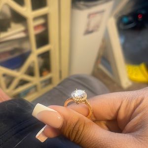 It’s a cz brass ring slightly wore